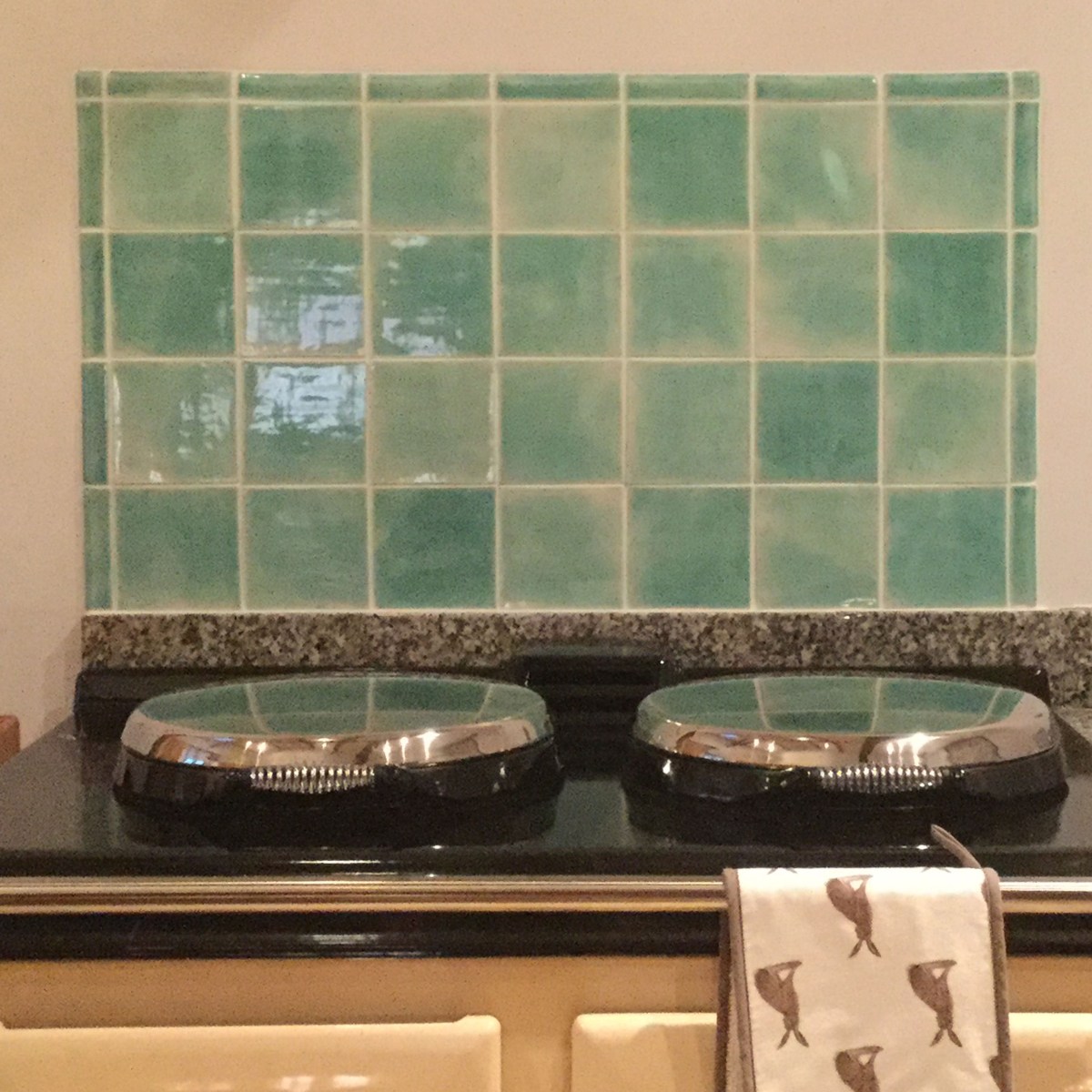 Handmade green tiles in kitchen
